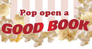 Pop Open A Good Book printed on a striped background with popcorn.
