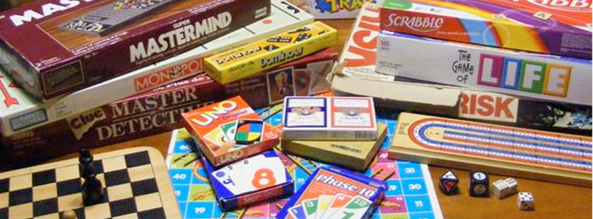 Piles of various board games.