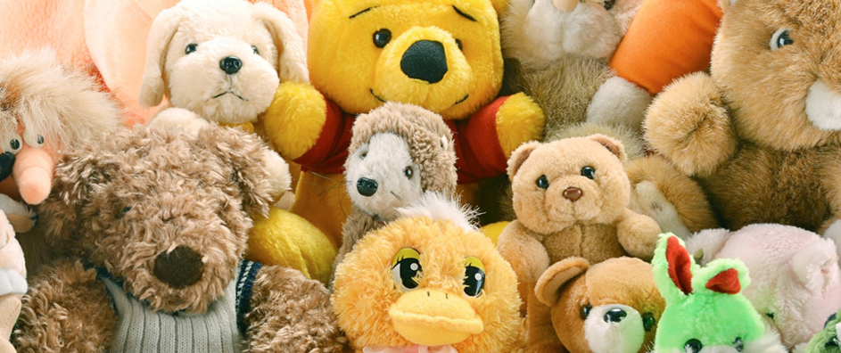 A pile of  stuffed animals.
