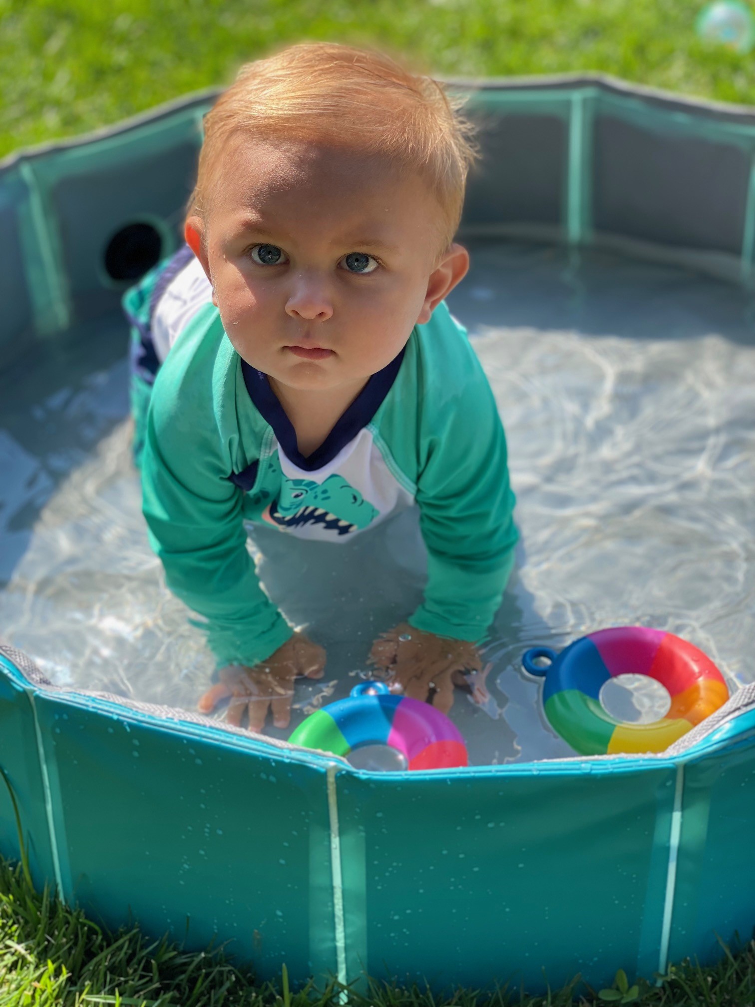 Child playing in pool during Water Play