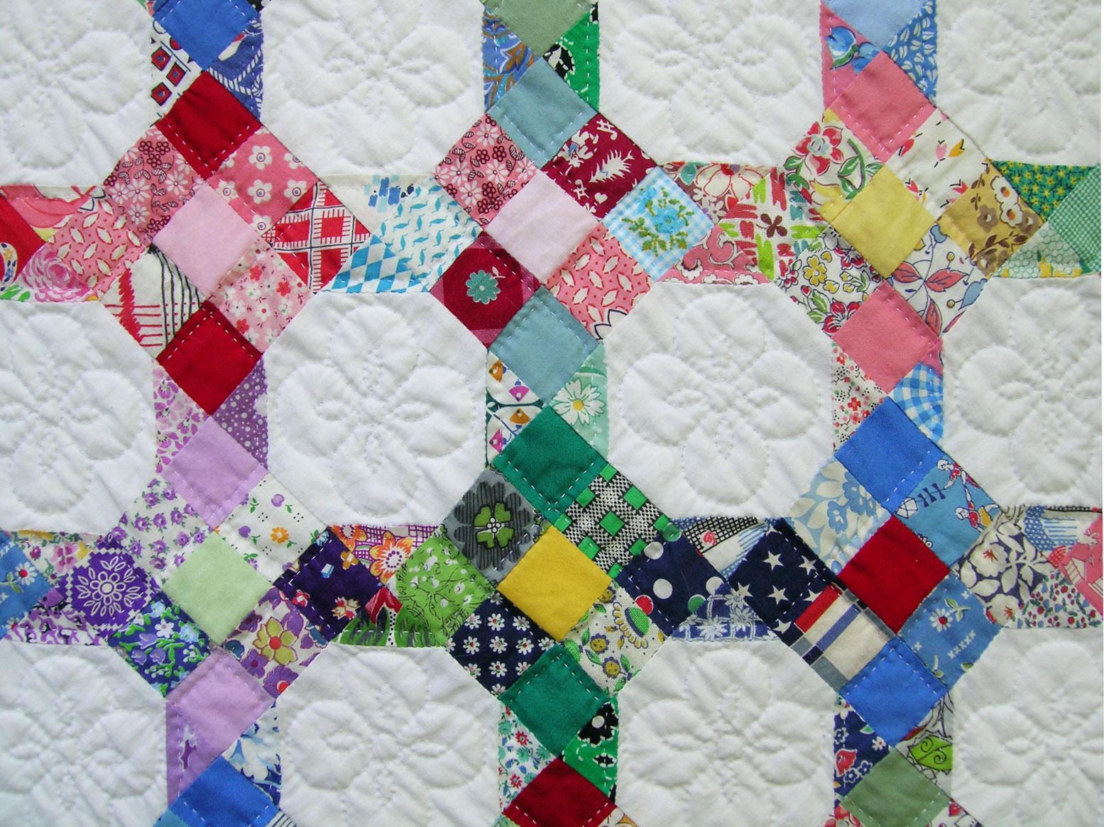 a section of a colorful quilt