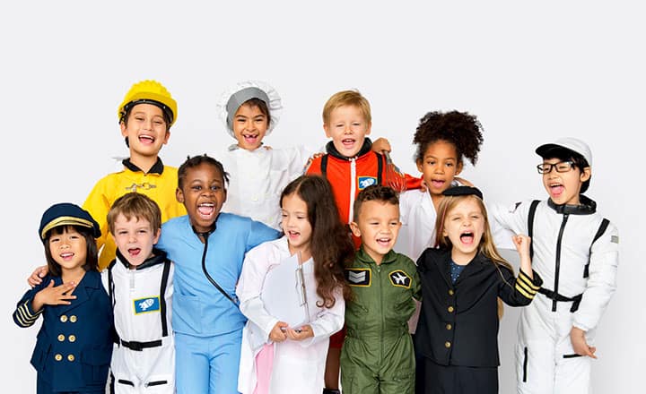 Children dressed in various community job uniforms.