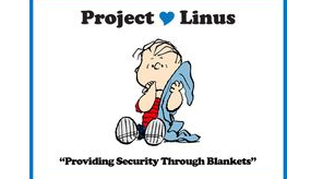 Photo features Linus character from Snoopy with his blanket. White background with black lettering.