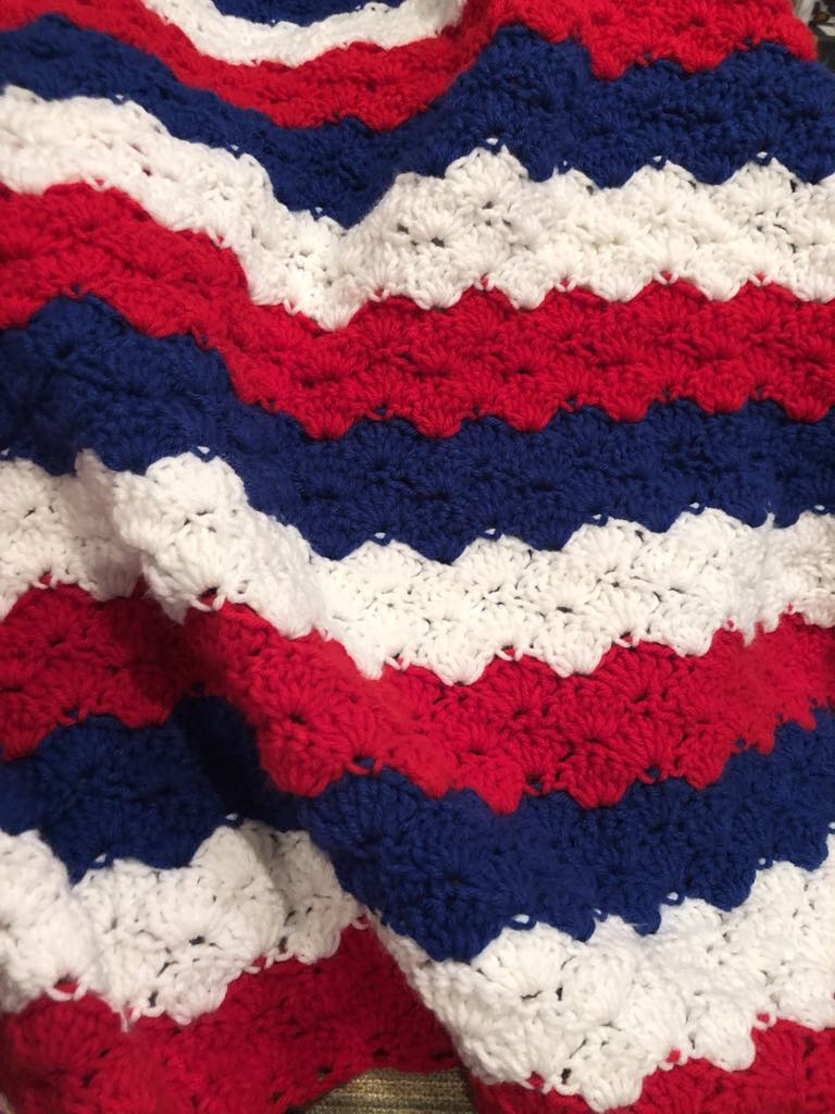 red white and blue crocheted blanket