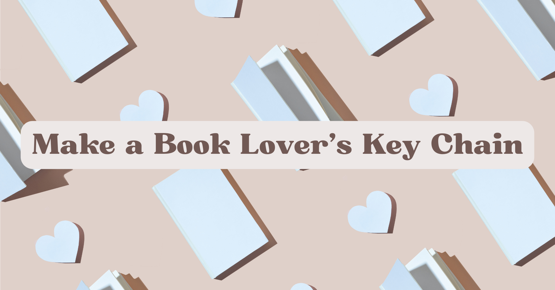Light pink background adorned with paper books and hearts