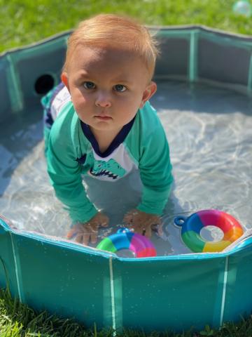 Child playing in pool during Water Play