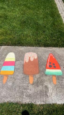 Sidewalk chalk art of popsicles.