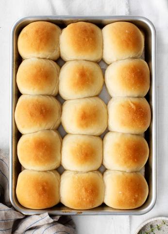 Photo of dinner rolls in a silver pan 