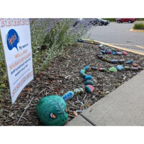 snake made of painted rocks