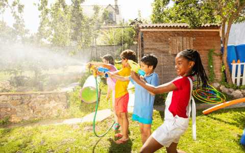 Kids with squirt guns & hoses.