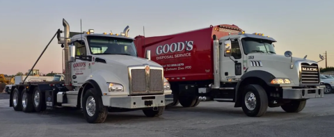 Photo of 2 garbage trucks