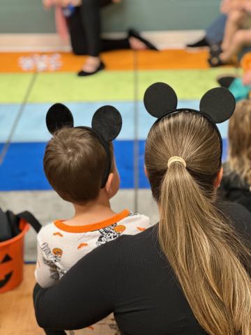 Mother and child wearing Mickey Ears