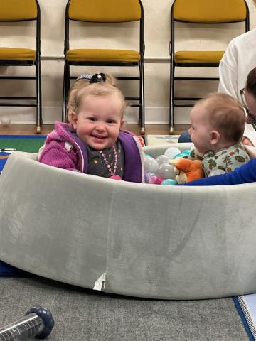 Child playing in ballpit