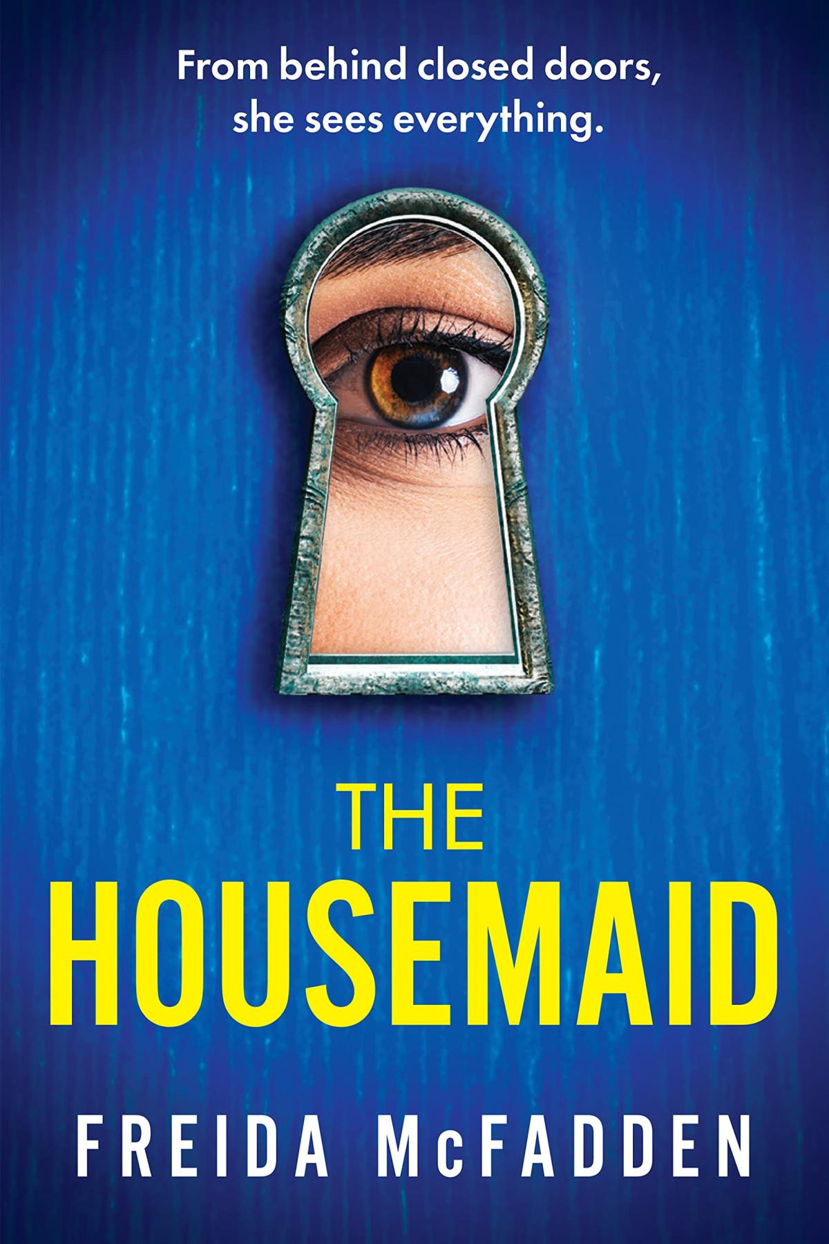 Cover of the Housemaid by Freida McFadden. Cover is blue with a keyhold and yellow lettering. 