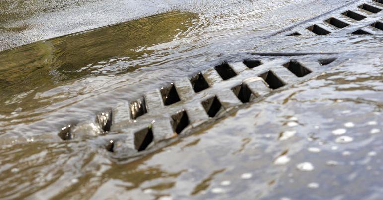 Water draining from street.