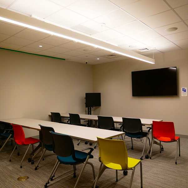 Media room with monitor and chairs