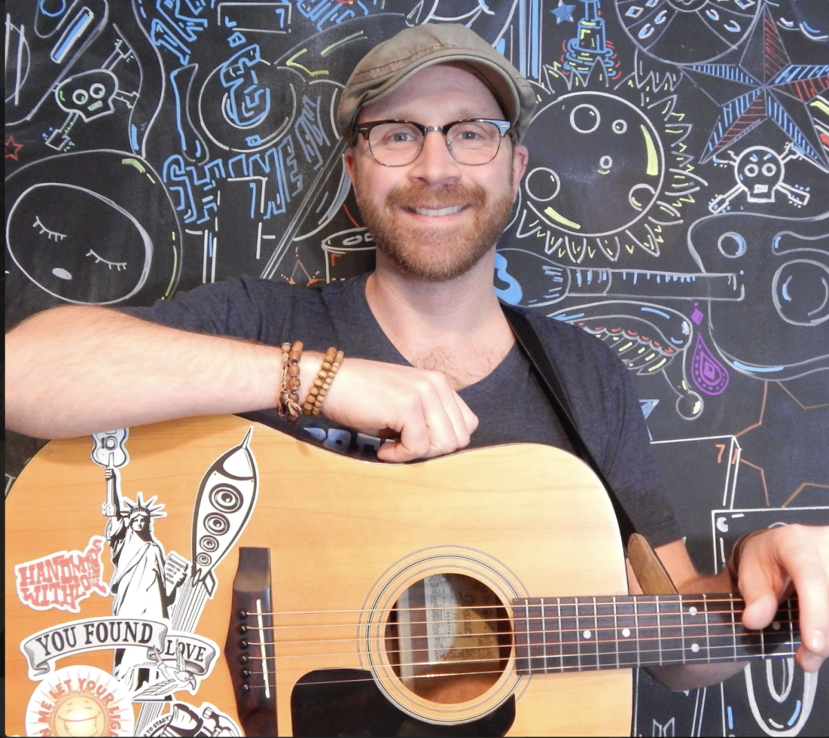 Mark De Rose with guitar