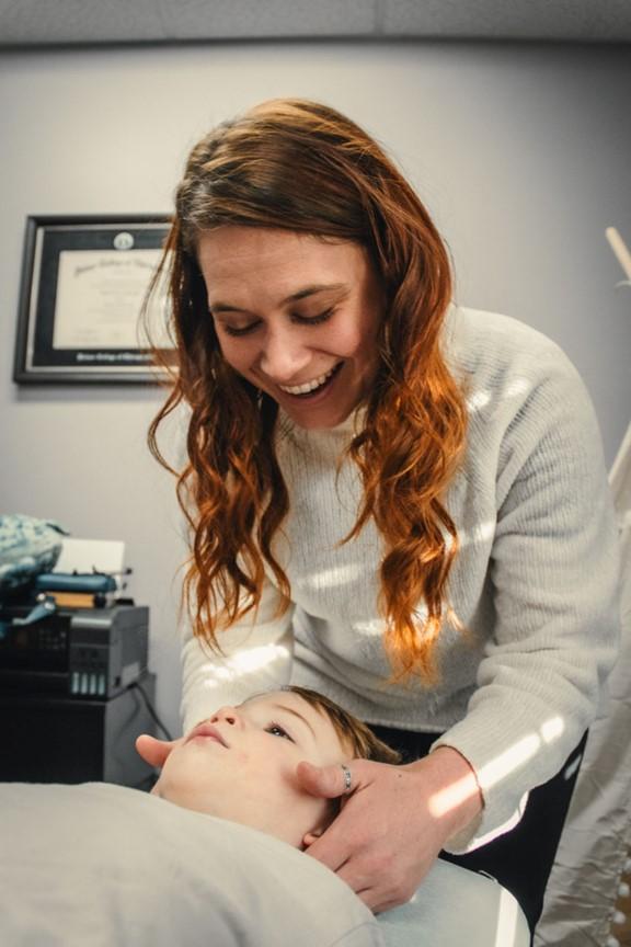 Dr. Abby performing an adjustment on a pediatric patient