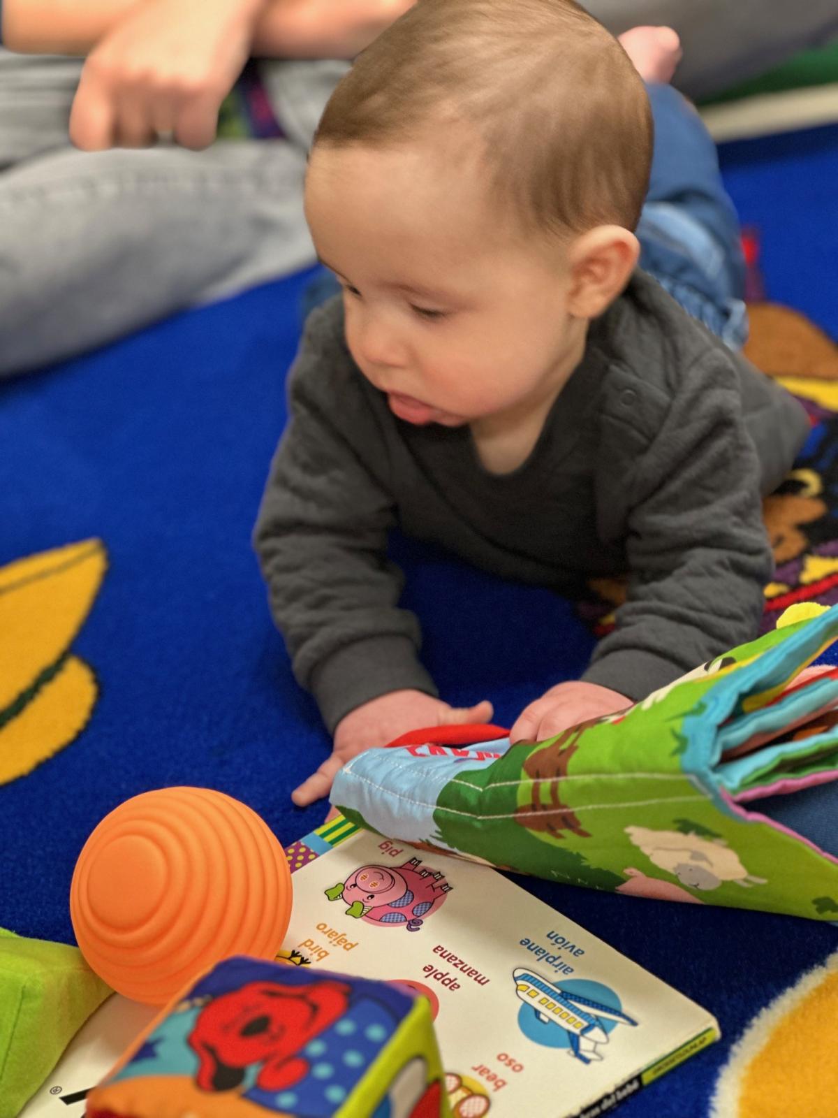 Child play with book