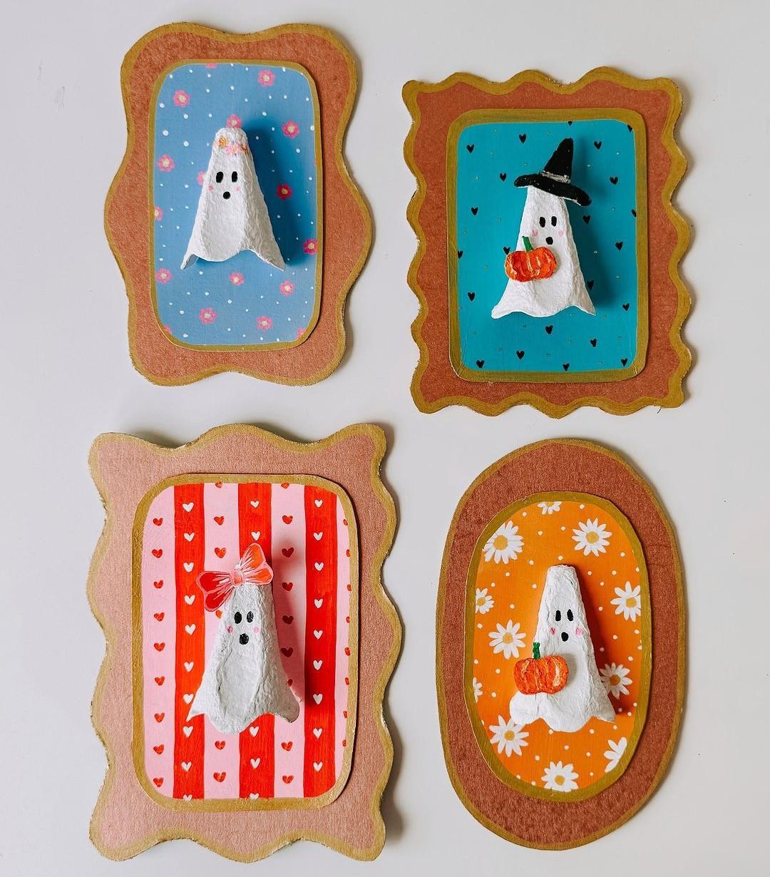 Four ghost portraits made from egg cartons and recycled materials