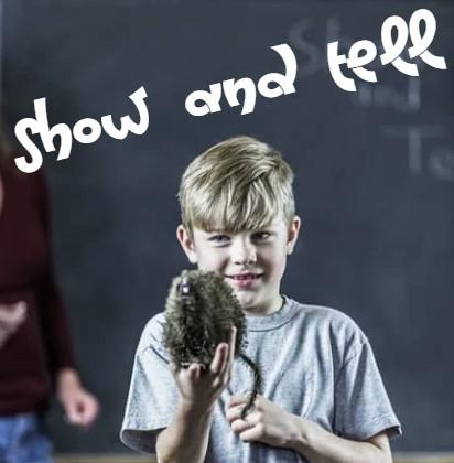 Boy showing & telling